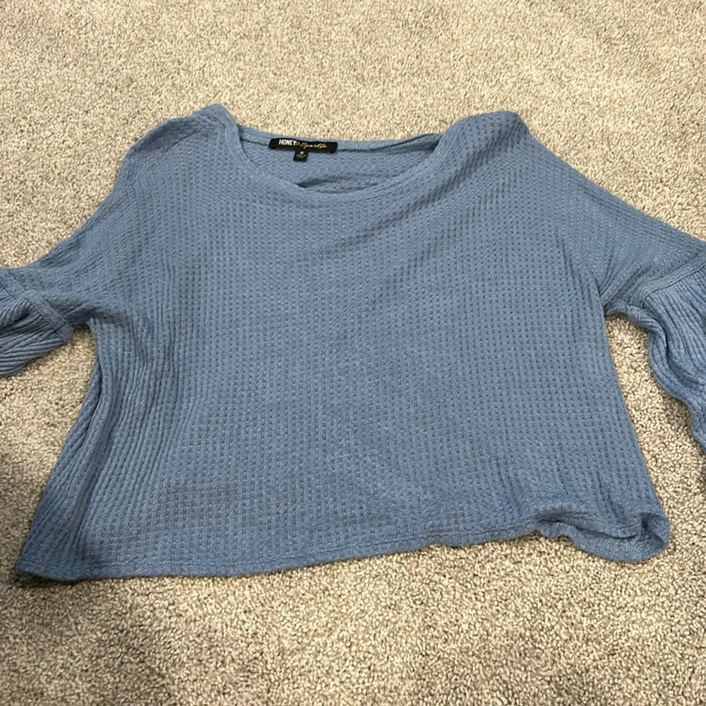 Small, light blue long sleeve